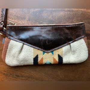 Leather and wool wristlet